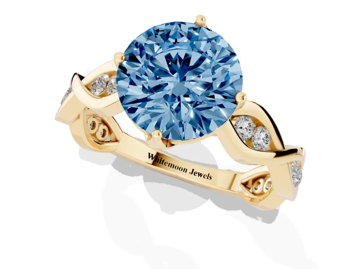 Fancy Blue Round Cut Solitaire Twist Band with Leaf Prong Setting Yellow gold