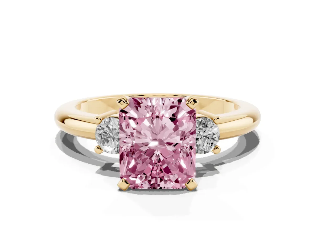 Fancy Pink Three-Stone Radiant Cut Cut Diamond Solitaire with Prong Setting and Classic Band Yellow gold