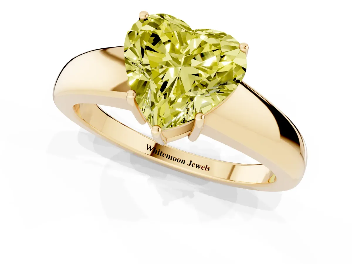 Fancy Yellow Heart Cut Solitaire Diamond Ring with Tapered Band and Four-Prong Setting Yellow gold