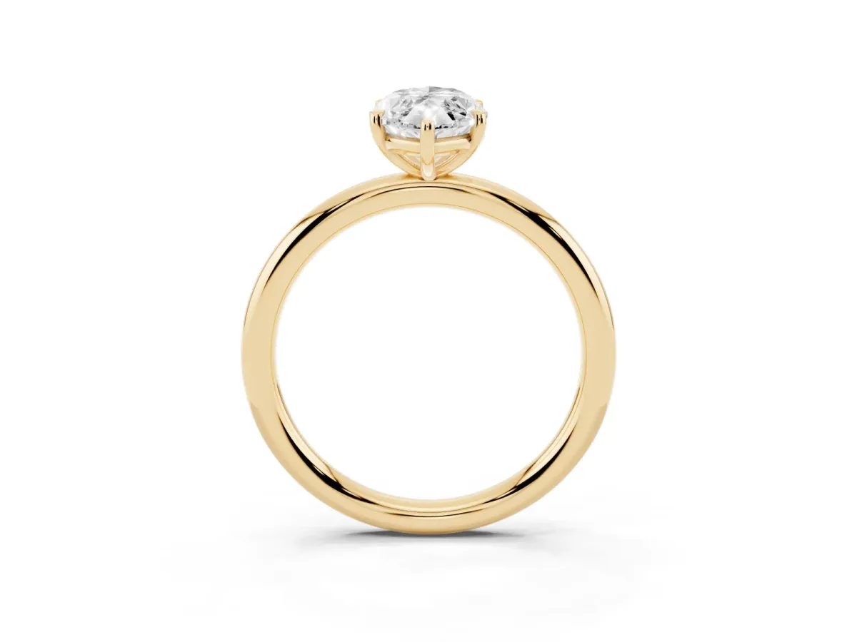 Marquise Cut Solitaire Diamond Ring with Four-Prong Setting on a Plain Band Yellow gold