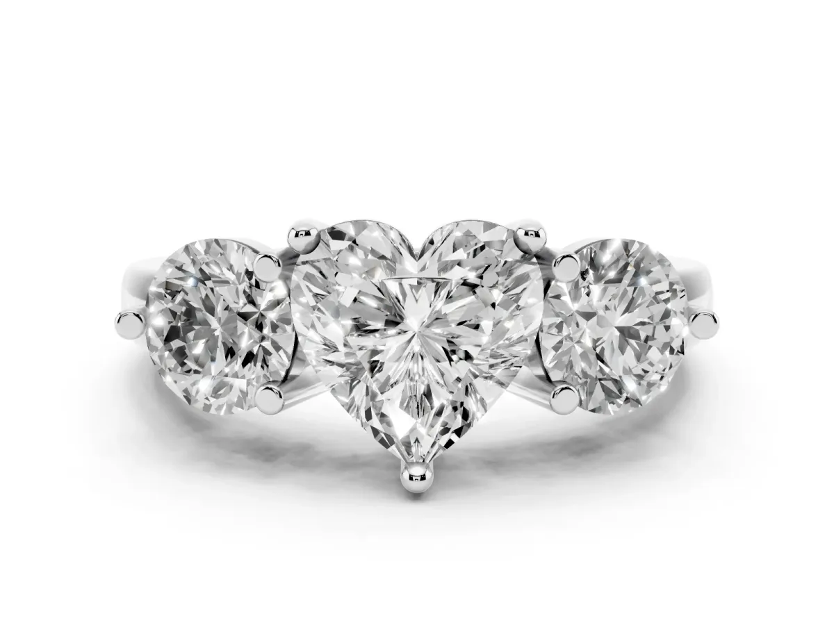 Three-Stone Heart Cut Brilliant Cut Solitaire Ring with Prong Setting on a Classic Band Silver