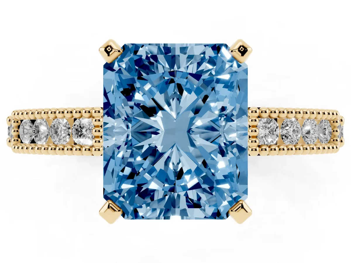 Fancy Blue Radiant Cut Solitaire with Pavé Band and Four-Prong Setting Yellow gold