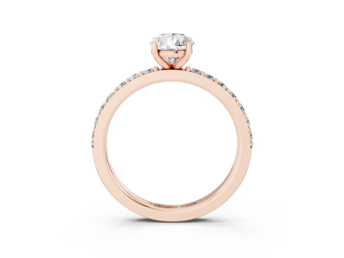 Pear Cut Cut Diamond Solitaire with Pave Band and Four-Prong Setting Rose gold