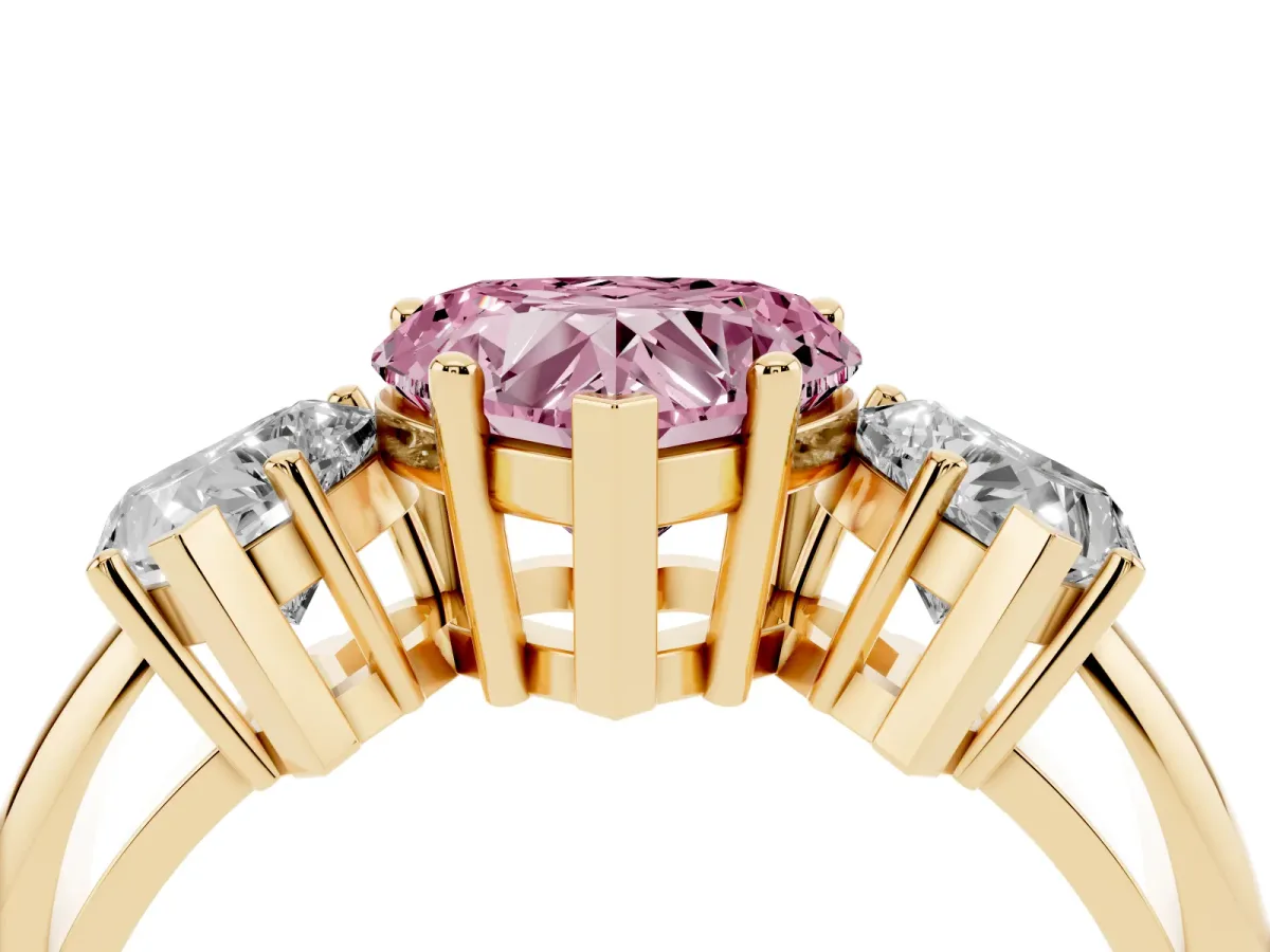 Fancy Pink Three-Stone Heart Cut Cut Diamond Engagement Ring with Prong Setting on a White Gold Band Yellow gold
