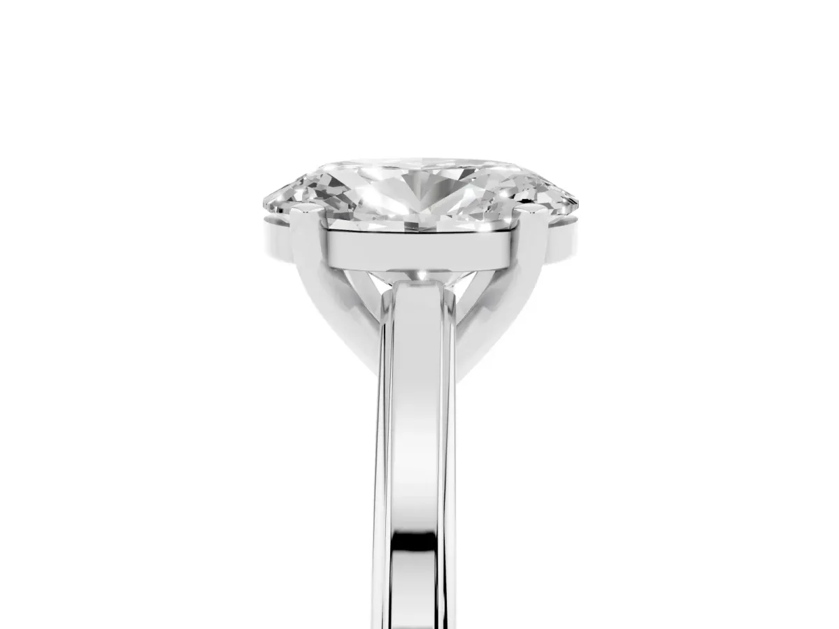 Oval Cut Solitaire Diamond Ring with Four-Prong Setting and Classic Band Silver