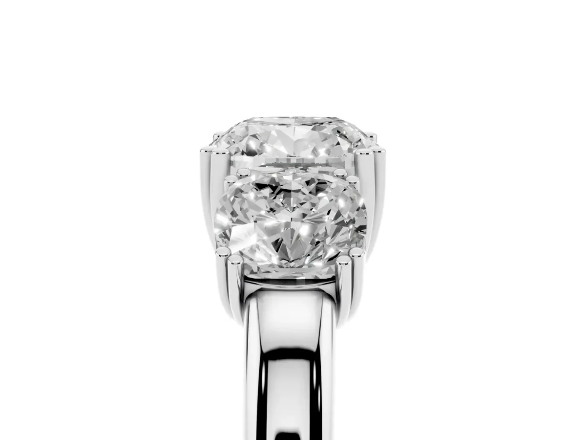 Three-Stone Cushion Cut Cut Diamond Ring with Channel Set Band and Four-Prong Setting Silver