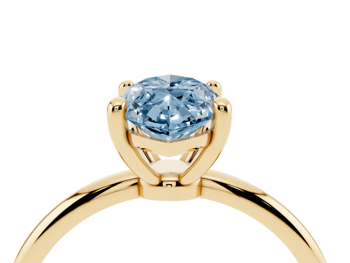 Fancy Blue Marquise Cut Solitaire Diamond Ring with 4-Prong Setting on a Classic Band Yellow gold