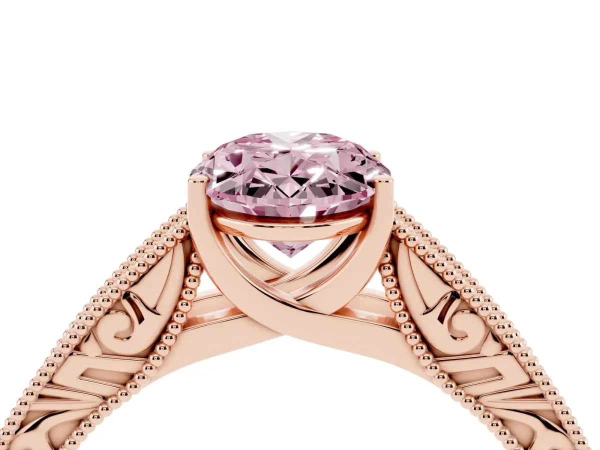 Fancy Pink Oval Cut Diamond Solitaire Ring with Engraved Band and Four-Prong Setting Rose gold