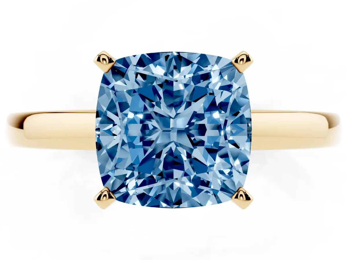 Fancy Blue Cushion Cut Solitaire Diamond Engagement Ring with Four-Prong Setting on a Classic Band Yellow gold