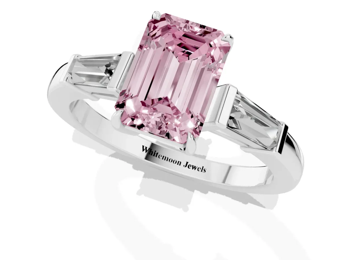 Fancy Pink Emerald Cut Diamond Three-Stone Ring with Tapered Baguette Side Stones and Prong Setting Platinum