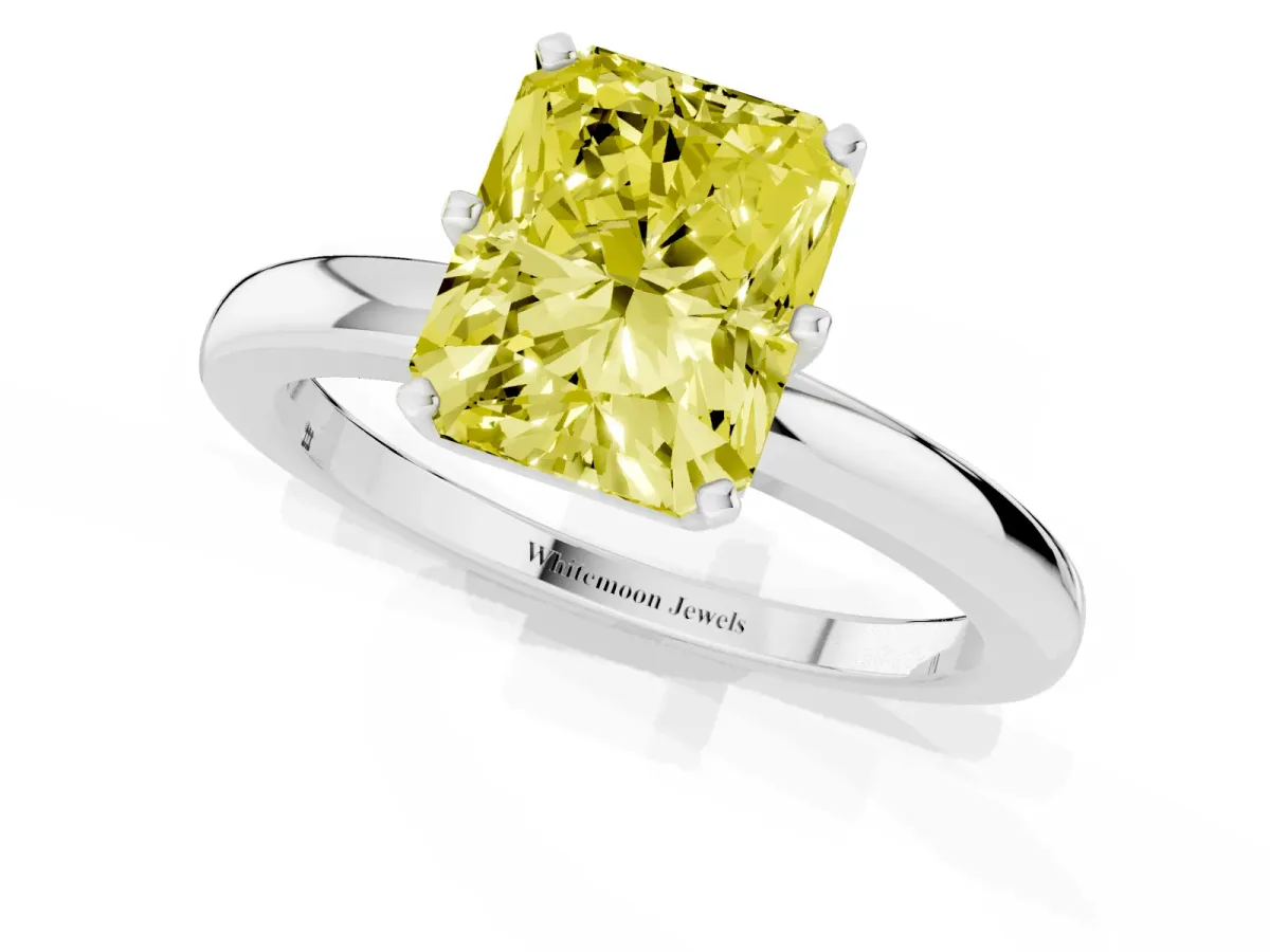 Fancy Yellow Radiant Cut Solitaire Diamond Ring with Six-Prong Setting on a Classic Band Silver