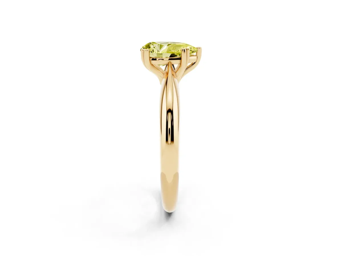 Fancy Yellow Pear Cut Cut Solitaire Engagement Ring with Tapered Band and Four-Prong Setting Yellow gold