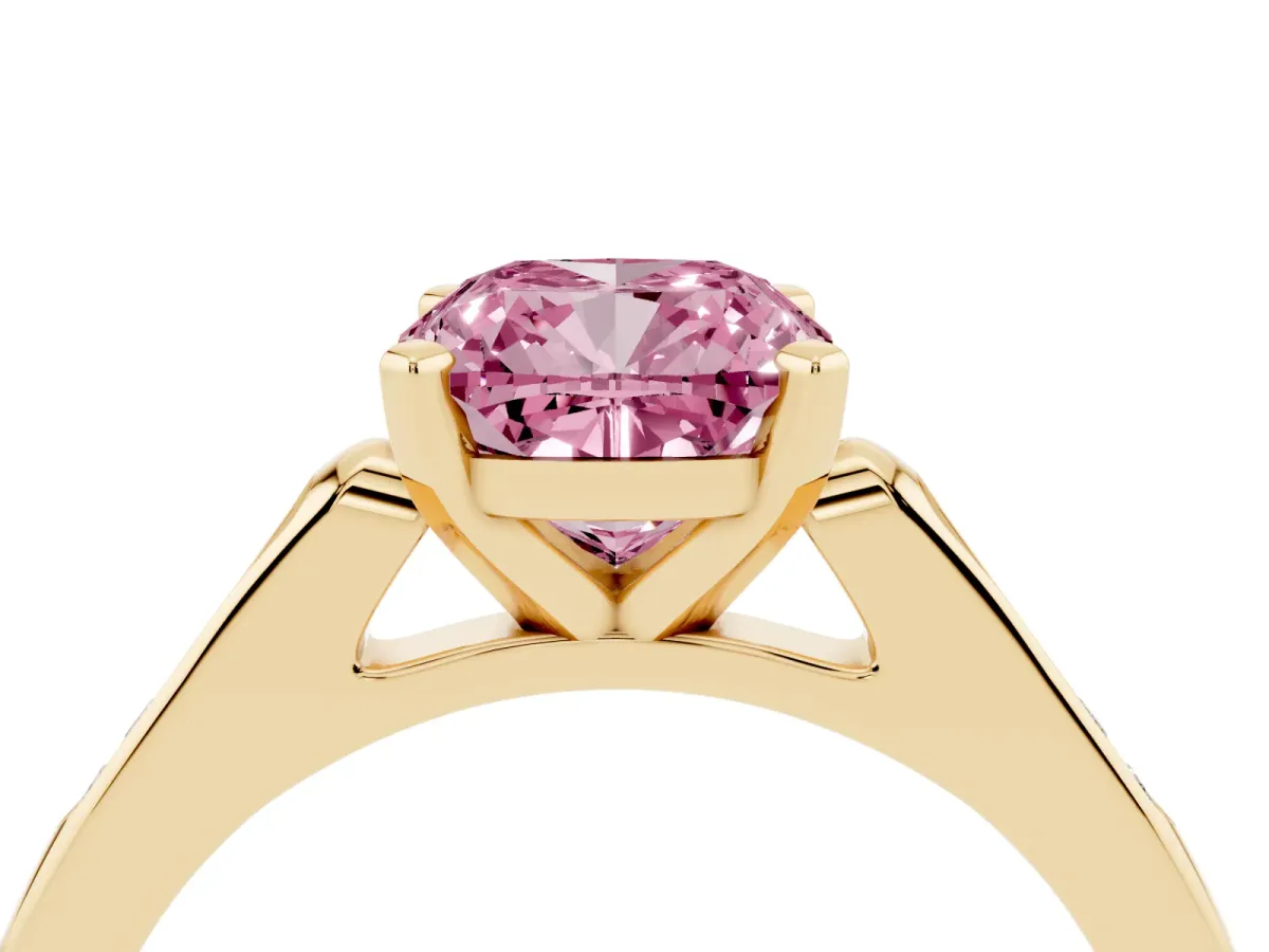 Fancy Pink Cushion Cut Diamond Solitaire Ring with Channel Set Round Band and Prong Setting Yellow gold