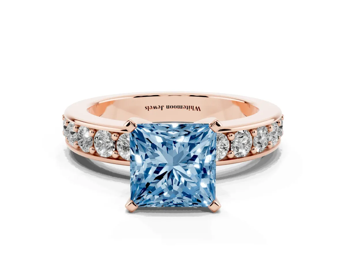Fancy Blue Princess Cut Diamond Engagement Ring with Channel Set Round Band and Prong Setting Rose gold
