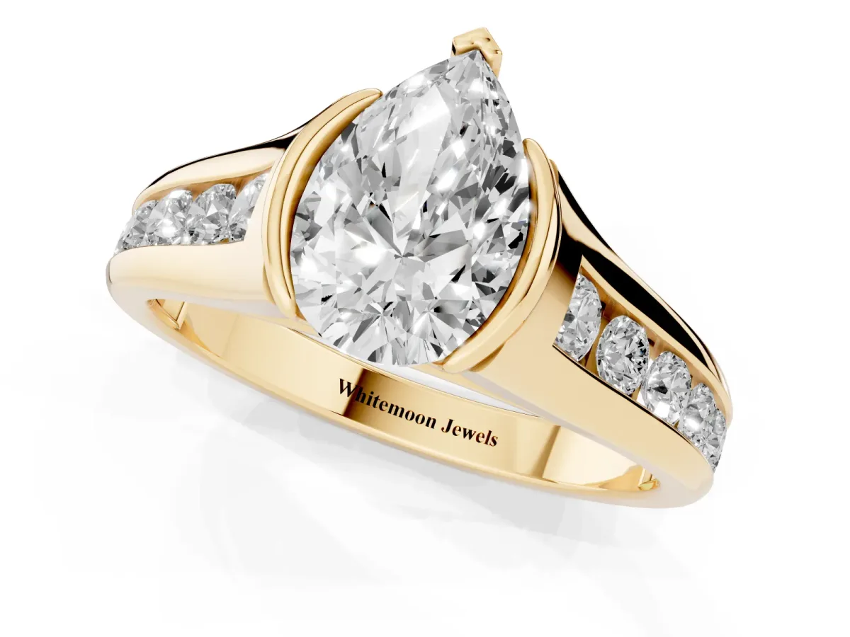 Pear Cut Solitaire Bezel-Set Diamond Ring with Channel-Set Band Yellow gold