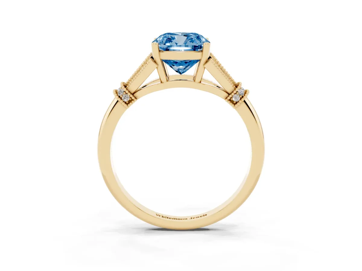 Fancy Blue Cushion Cut Diamond Solitaire Ring with Floral Filigree and Pave Accents Yellow gold