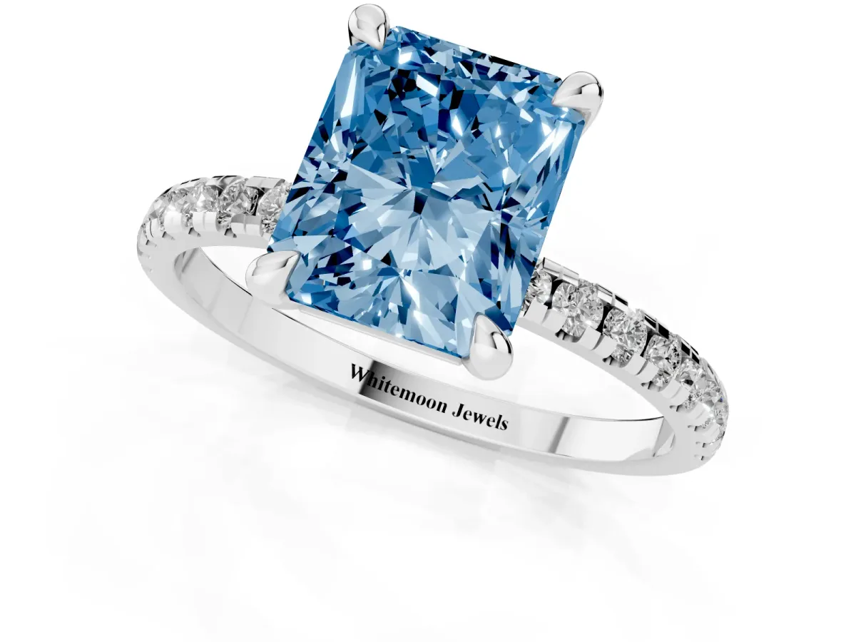 Fancy Blue Radiant Cut Diamond Brilliant Solitaire Ring with Pavé Band and Four-Prong Setting Silver
