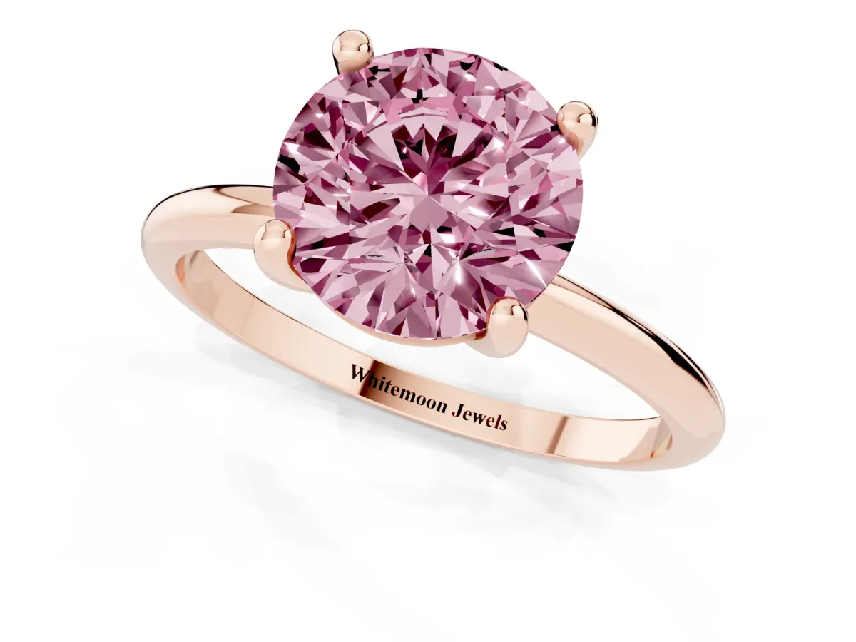 Fancy Pink Round Cut Solitaire Diamond Ring with 4-Prong Setting on a Classic Band Rose gold
