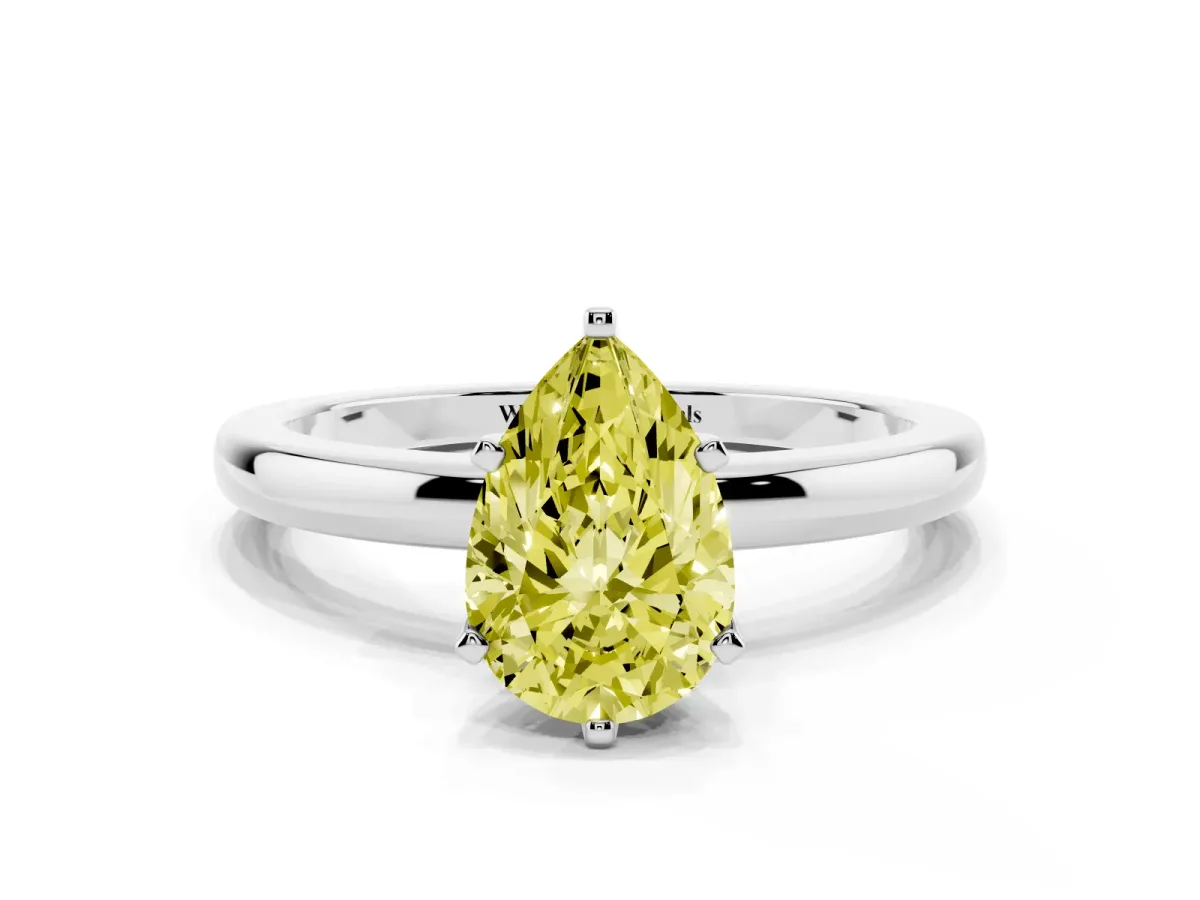 Fancy Yellow Pear Cut Solitaire Diamond Ring with Six-Prong Setting on a Classic Band Silver