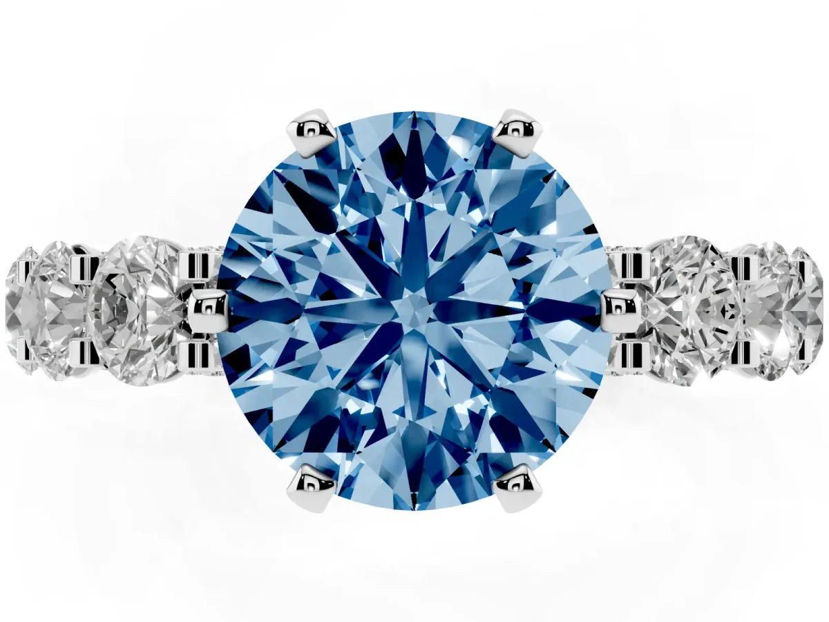 Fancy Blue Round Cut Diamond Side Stone Engagement Ring with Four-Prong Setting Silver
