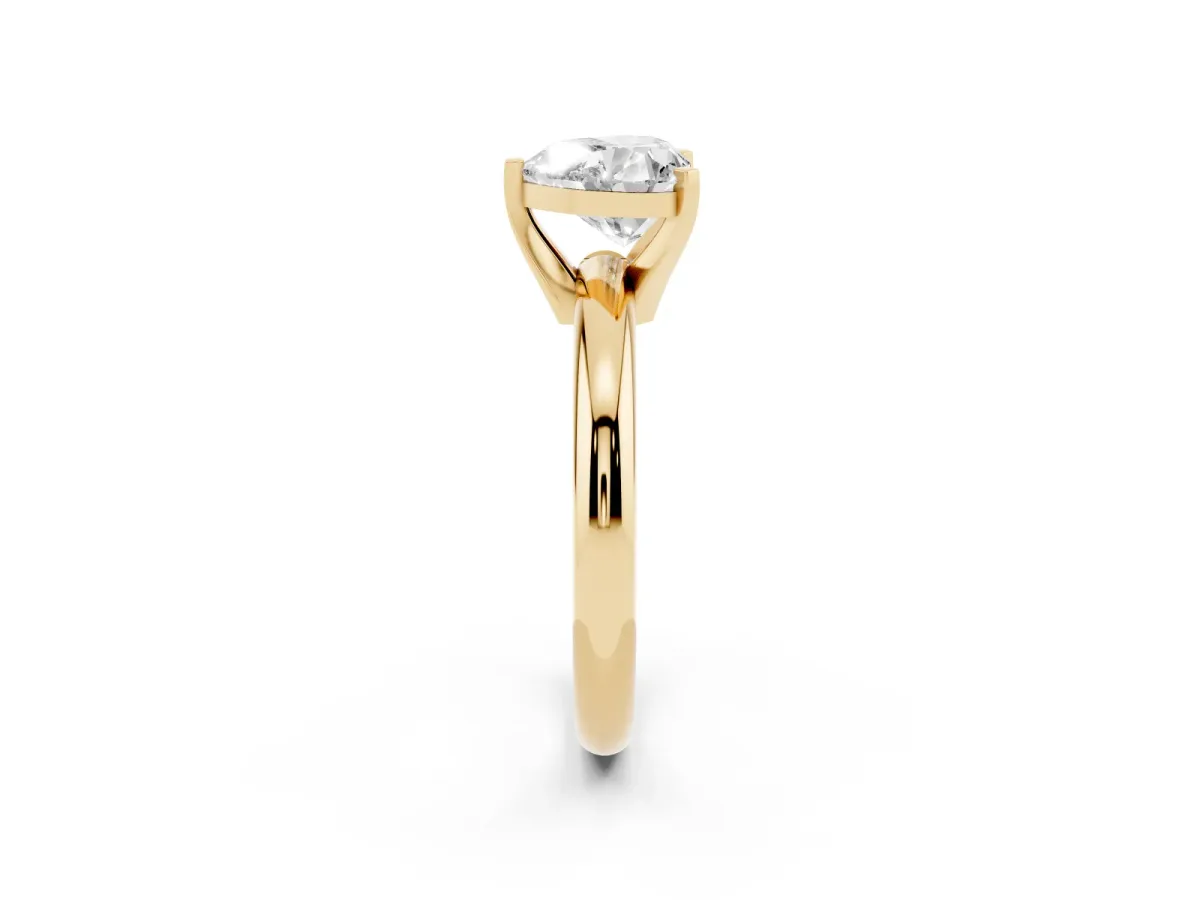 Heart Cut Diamond Solitaire Engagement Ring with Round Band and Four-Prong Setting Yellow gold