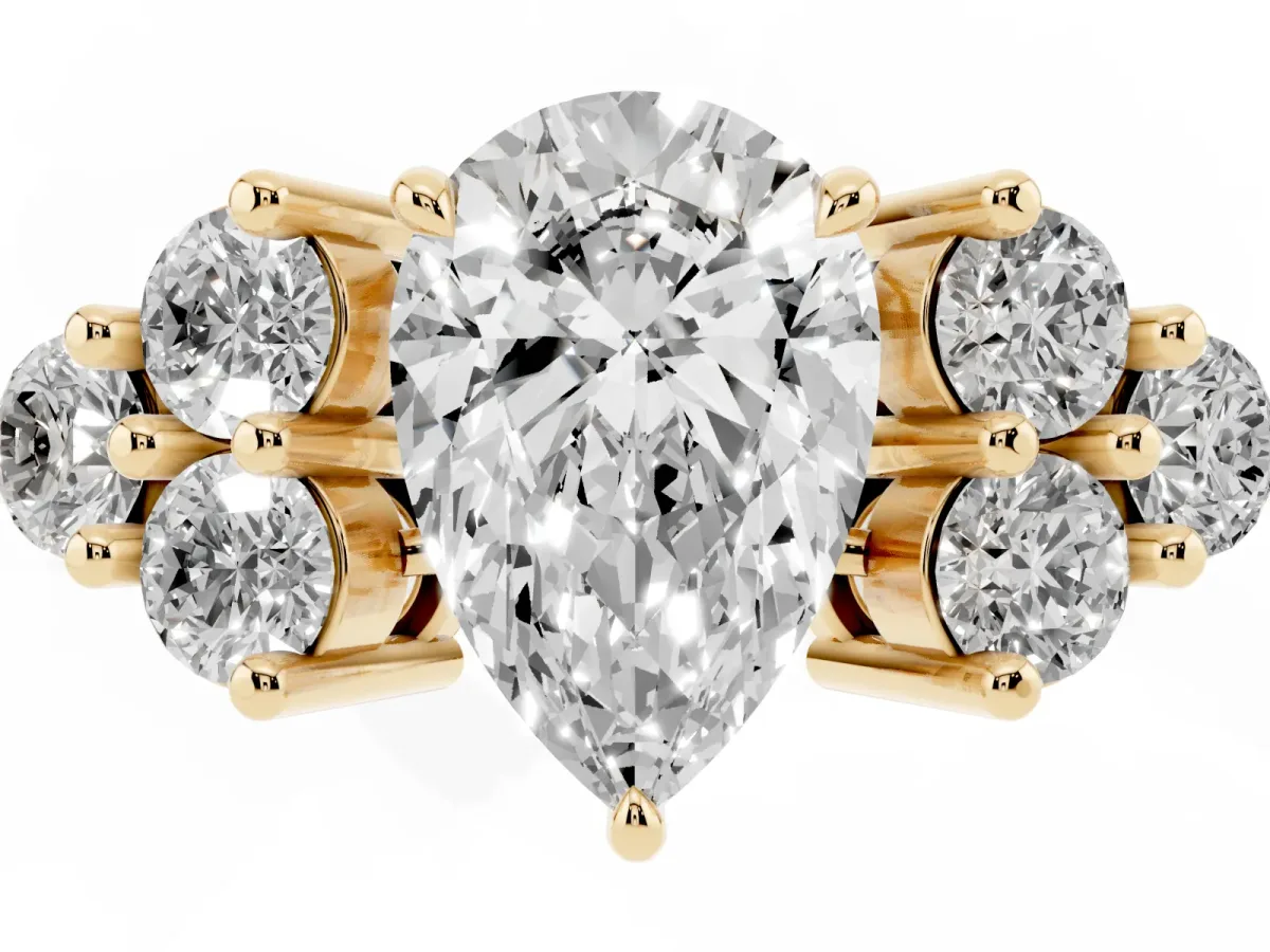Pear Cut Brilliant Diamond Cluster Accent Solitaire Ring with Prong Setting Yellow gold
