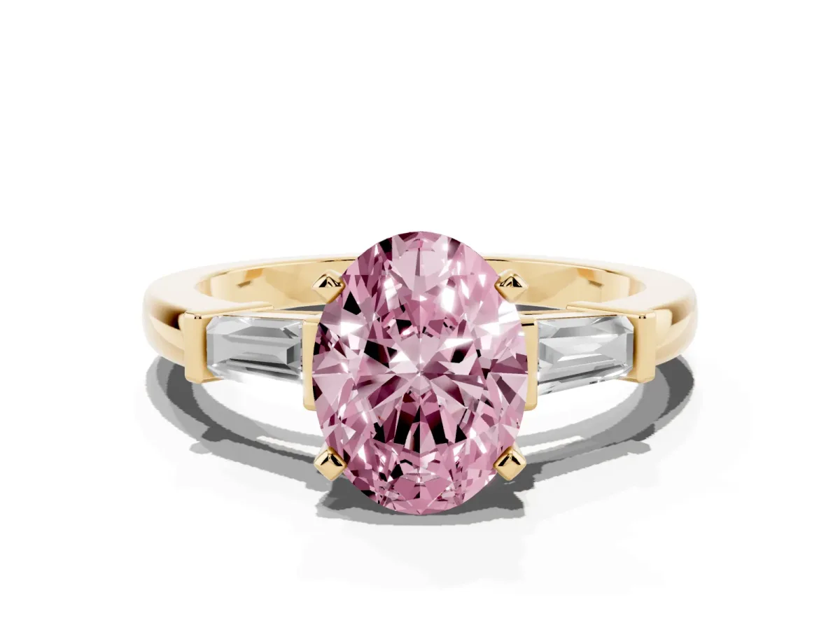 Fancy Pink Oval Cut Cut Diamond Solitaire Ring with Tapered Baguette Accents and Four-Prong Setting Yellow gold
