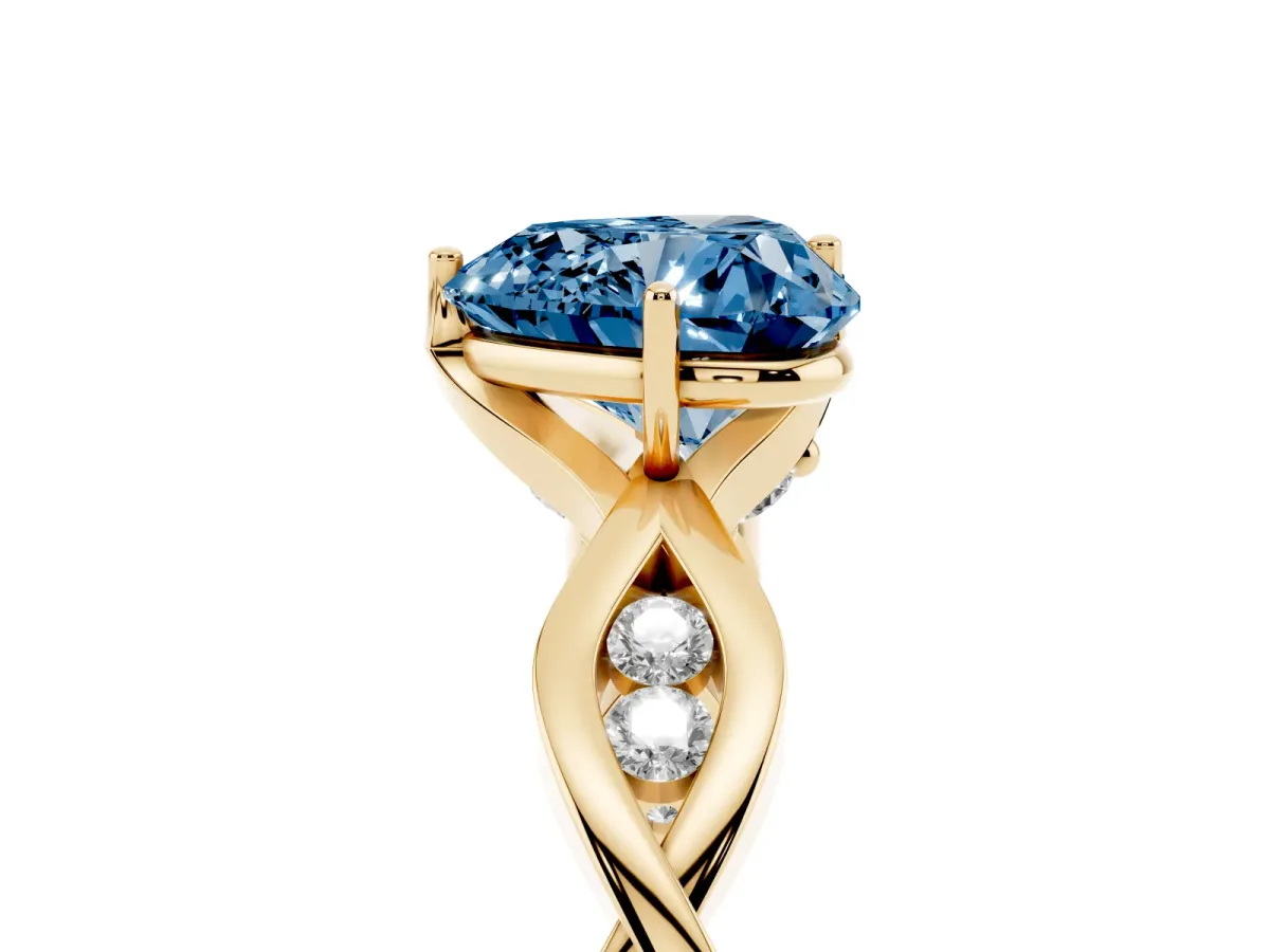 Fancy Blue Heart Cut Solitaire Twist Band with Leaf Prong Setting Yellow gold