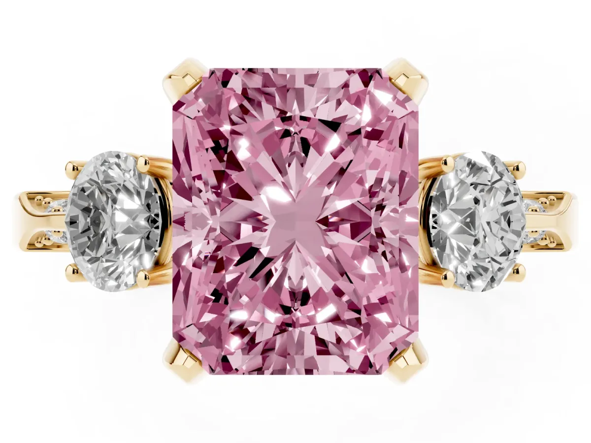 Fancy Pink Radiant Cut Brilliant Three-Stone Diamond Ring with Pavé Band and Four-Prong Setting Yellow gold