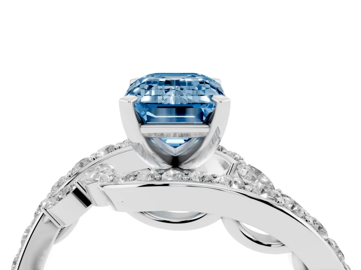 Fancy Blue Emerald Cut Solitaire with Pavé Twist Band and Four-Prong Setting Silver