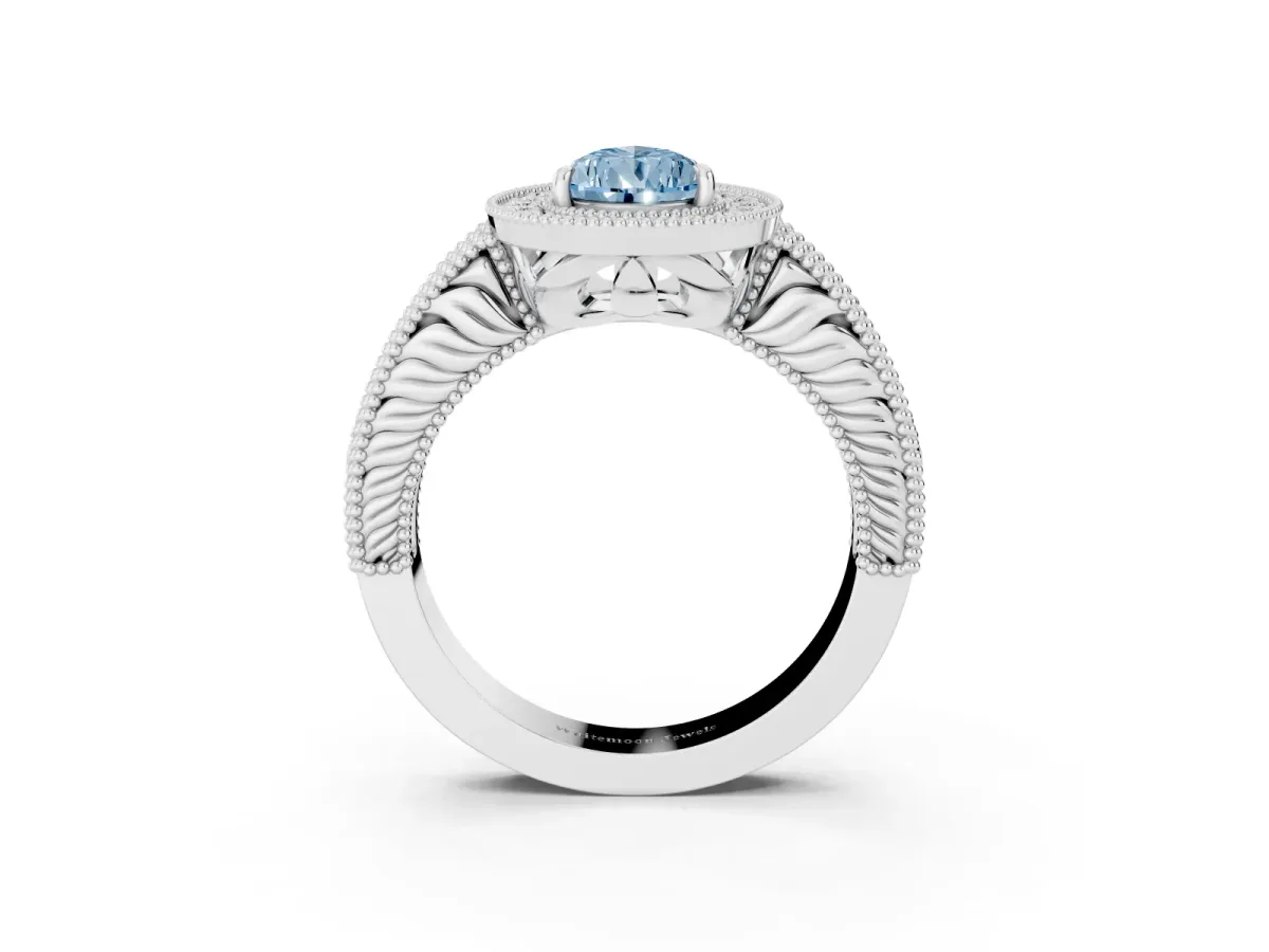 Fancy Blue Pear Cut Cut Halo Diamond Ring with Pavé Band and Four-Prong Setting Platinum
