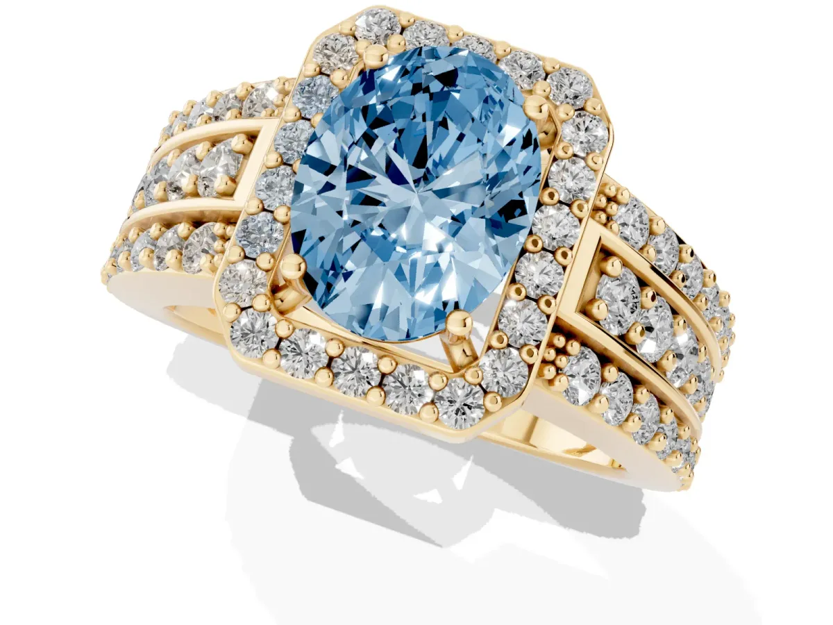 Fancy Blue Oval Cut Halo Diamond Ring with Round Split Shank and Prong Setting Yellow gold