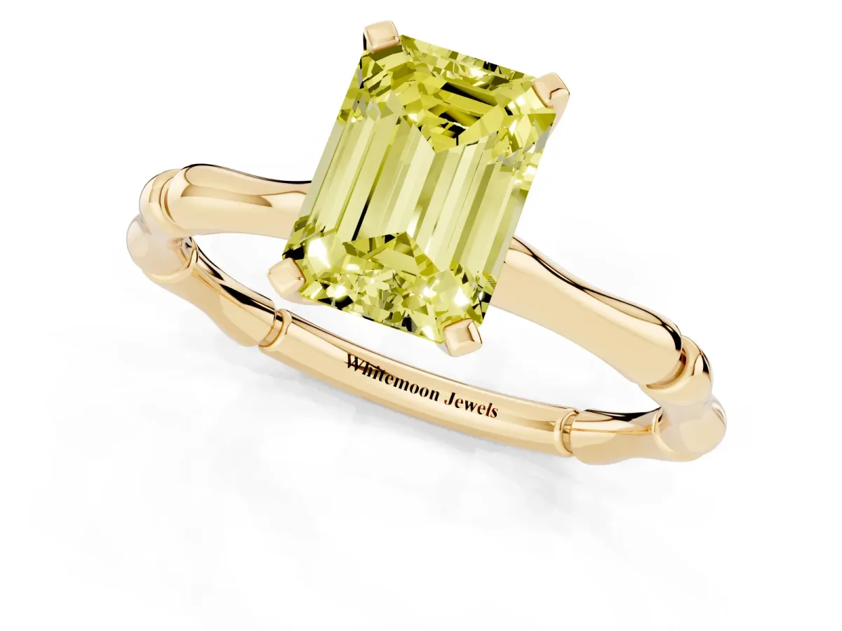 Fancy Yellow Emerald Cut Solitaire Diamond Ring with Bamboo Band and Four-Prong Setting Yellow gold