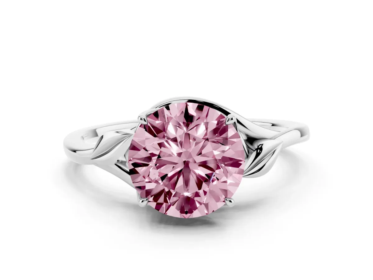 Fancy Pink Round Cut Diamond Solitaire Ring with Twist Band and Four-Prong Setting Silver