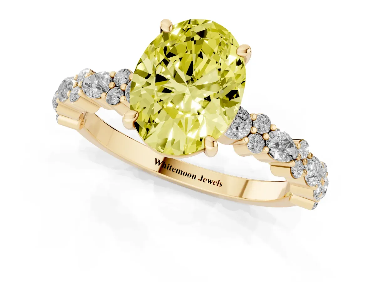 Fancy Yellow Oval Cut Diamond Side Stone Solitaire Ring with Round and Four-Prong Setting Yellow gold
