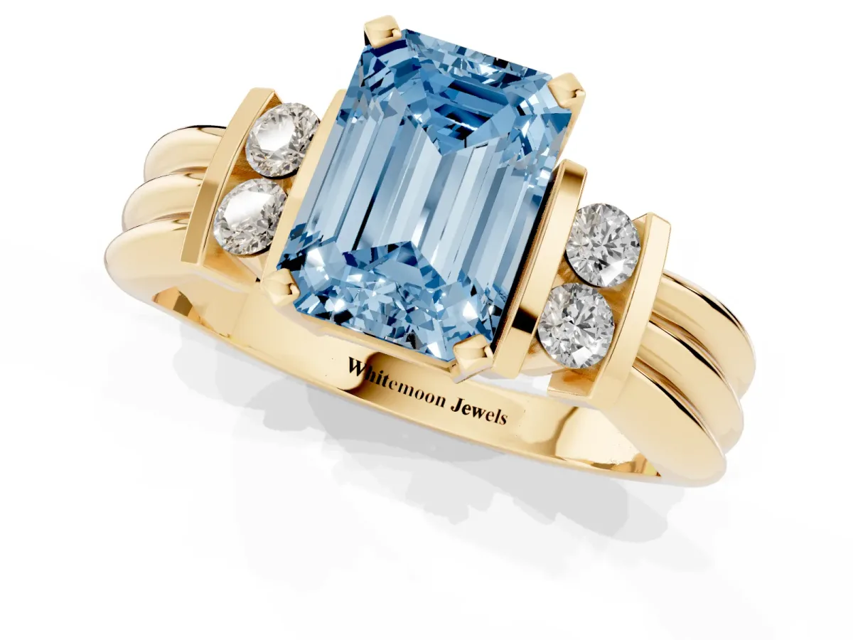 Fancy Blue Emerald Cut Cut Three-Stone Channel Set Ring with Bar Prongs Yellow gold