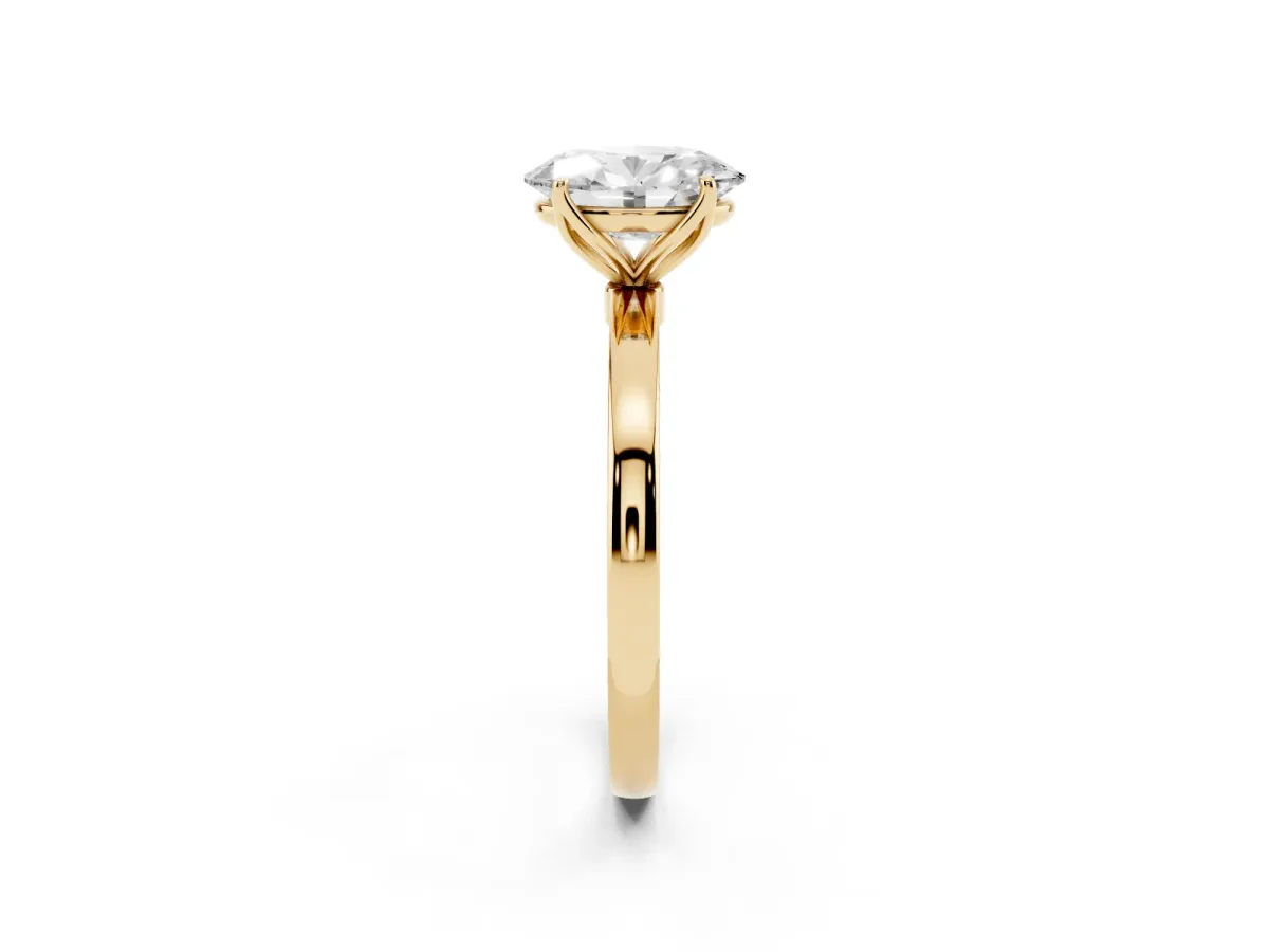 Oval Cut Diamond Solitaire Ring with Thin Band and Prong Setting Yellow gold