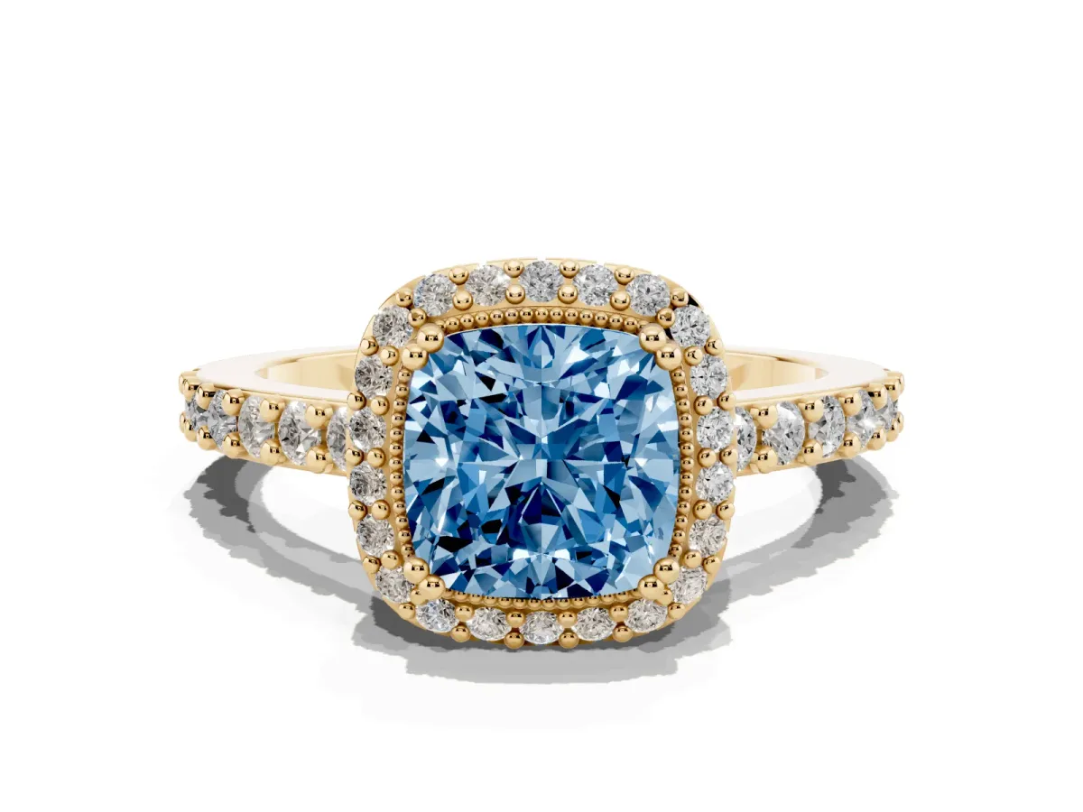 Fancy Blue Cushion Cut Cut Diamond Halo Engagement Ring with Milgrain Detail and Pavé Band Yellow gold
