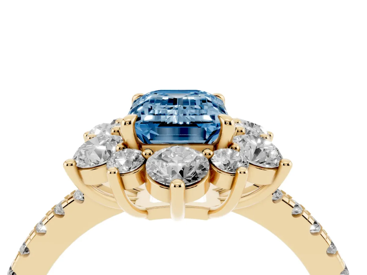 Fancy Blue Emerald Cut Diamond Floral Halo Ring with Round Pavé Band and Prong Setting Yellow gold