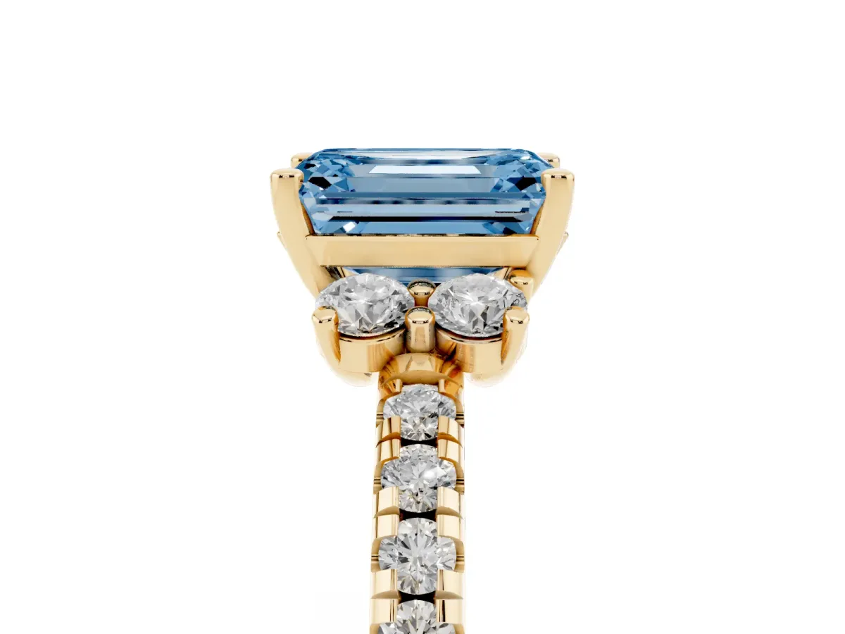 Fancy Blue Emerald Cut Diamond Three-Stone Pave Band with Four-Prong Setting Yellow gold