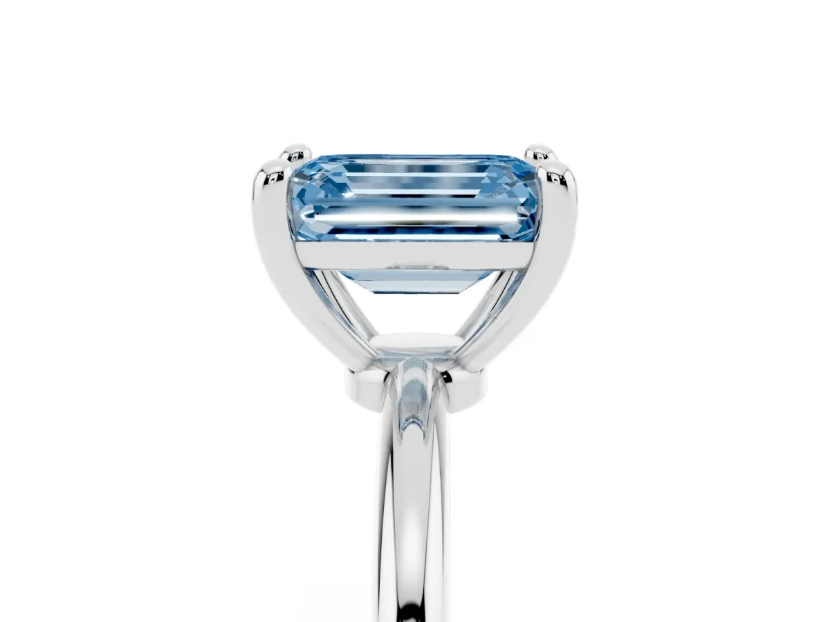 Fancy Blue Emerald Cut Solitaire Diamond Ring with 4-Prong Setting on a Classic Band Platinum