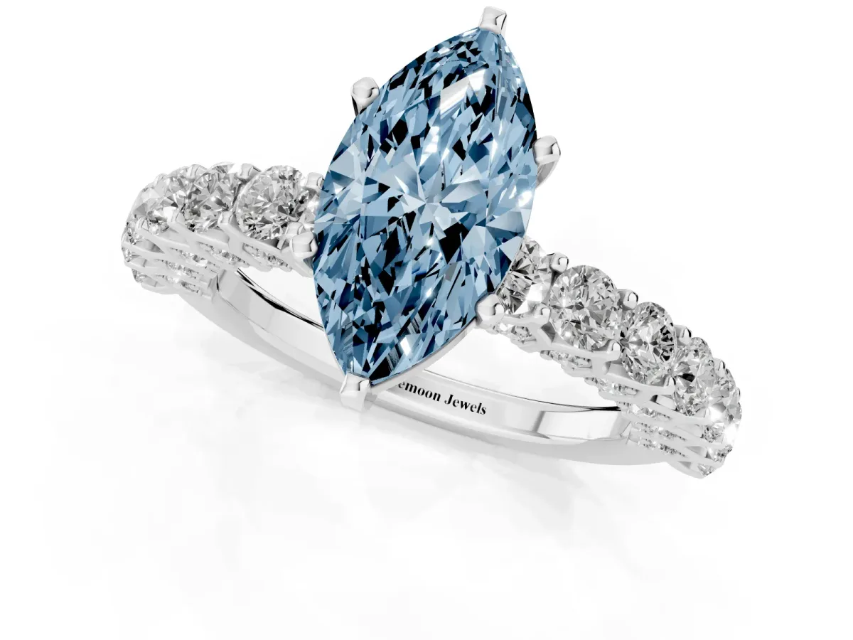 Fancy Blue Marquise Cut Diamond Solitaire Ring with Shared Prong Pavé Band and Four-Prong Setting Silver