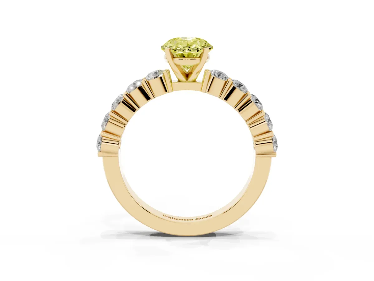 Fancy Yellow Oval Cut Diamond Solitaire Ring with Shared Prong Round Side Stones Yellow gold