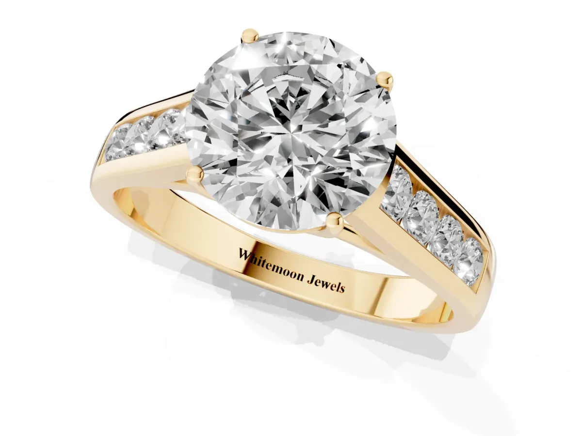 Round Cut Brilliant Channel-Set Solitaire Ring with Four-Prong Setting Yellow gold