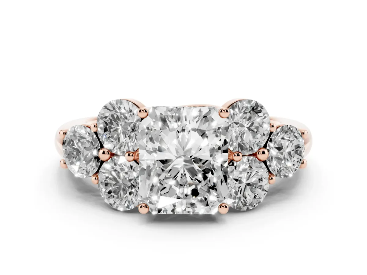 Radiant Cut Cut Diamond Cluster Ring with Round Accent Stones and Prong Setting on a Classic Band Rose gold