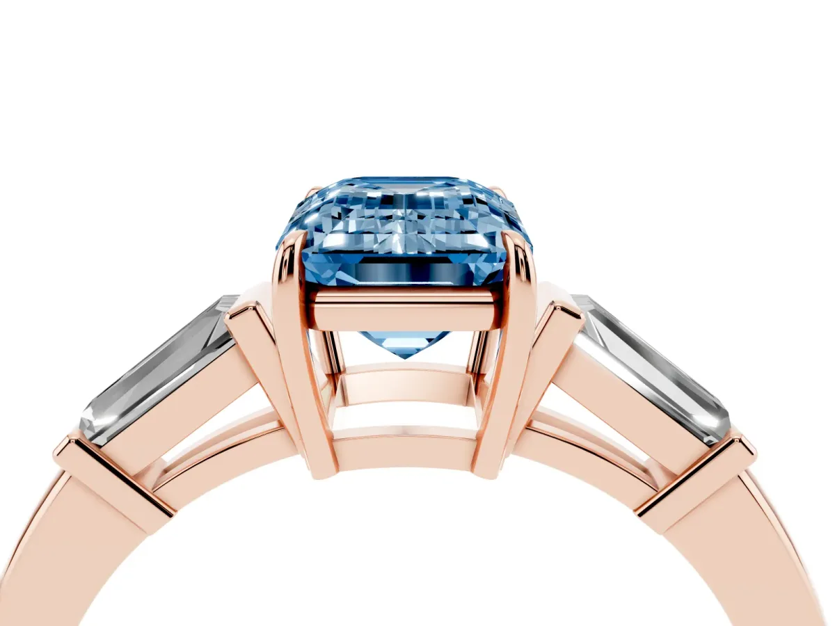 Fancy Blue Emerald Cut Diamond Three-Stone Ring with Tapered Baguette Side Stones and Prong Setting Rose gold