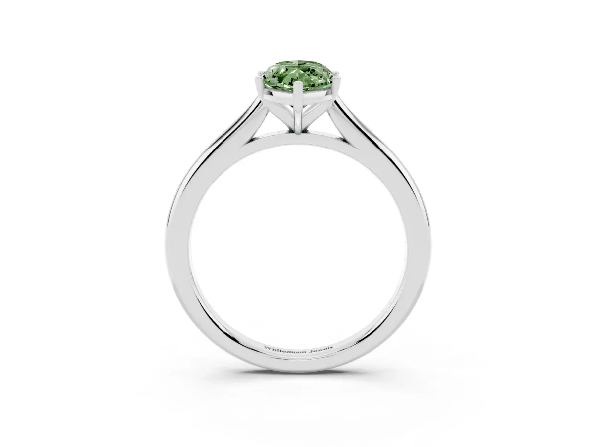 Fancy Green Marquise Cut Cut Solitaire Ring with Cathedral Band and Four-Prong Setting Silver