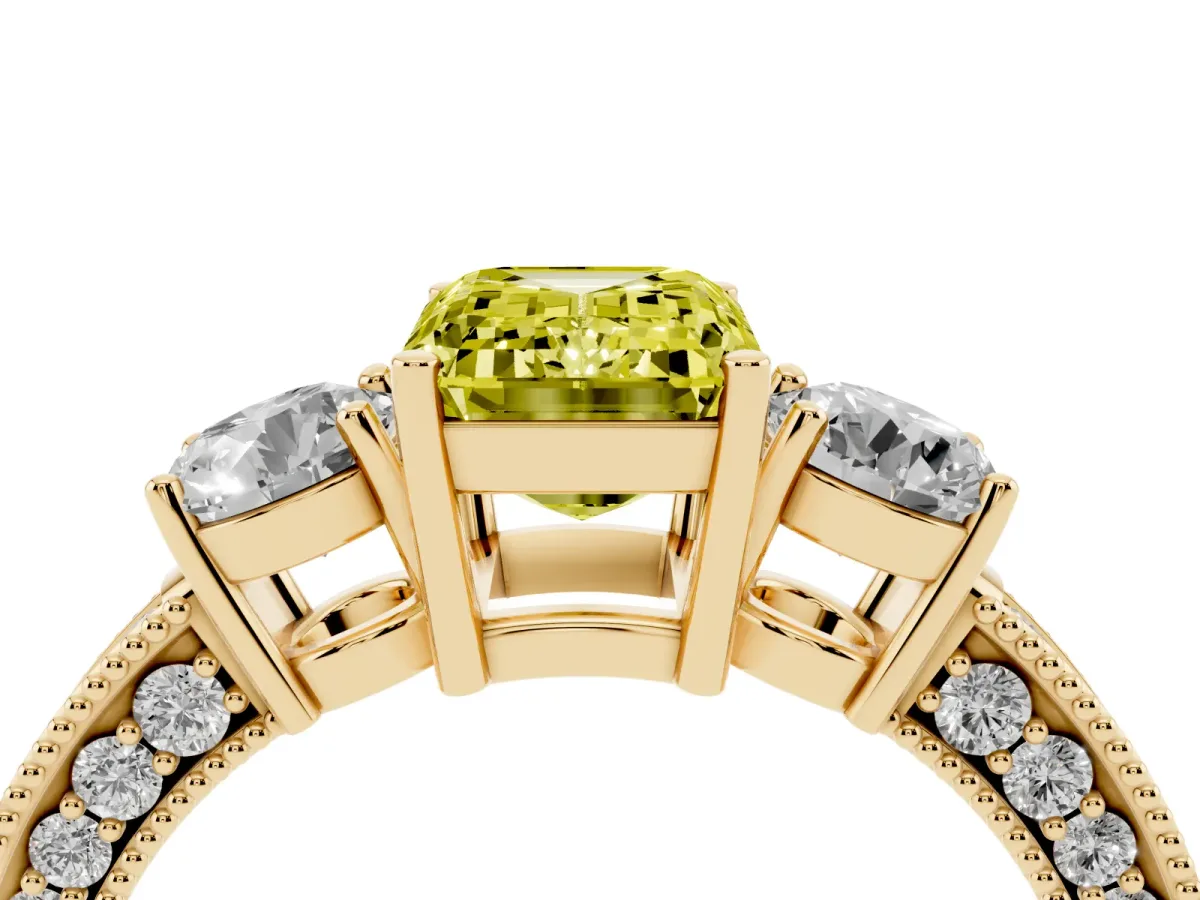 Fancy Yellow Emerald Cut Three-Stone Diamond Ring with Pavé Band and Four-Prong Setting Yellow gold