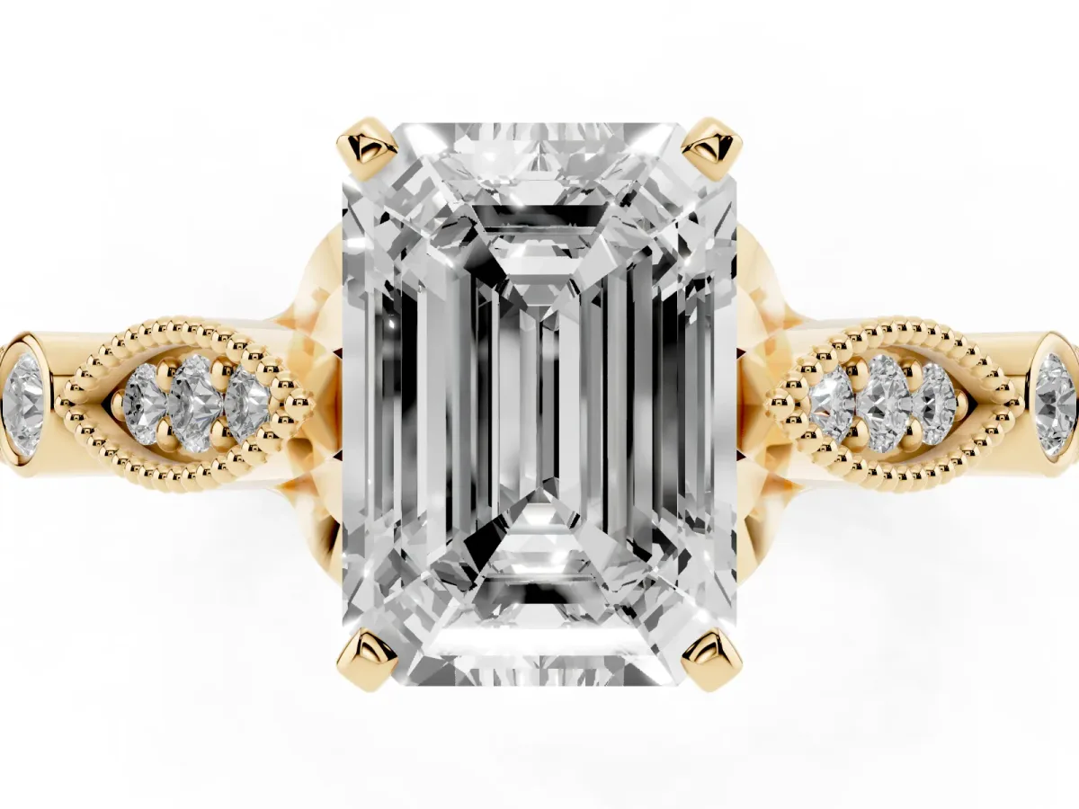 Emerald Cut Cut Diamond with Milgrain Marquise and Bezel Accents on a Solitaire Band with Prong Setting Yellow gold