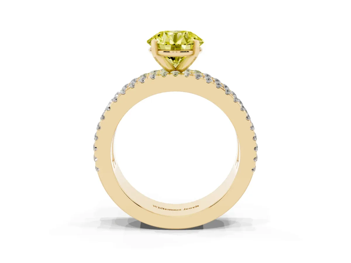 Fancy Yellow Round Cut Diamond Solitaire Ring with Pavé and Channel Set Band Yellow gold